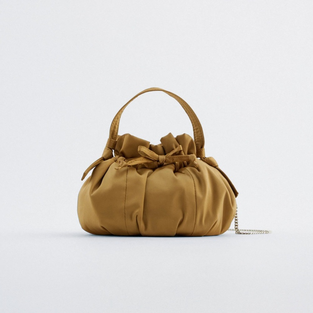 NWOT Gold satin bucket bag